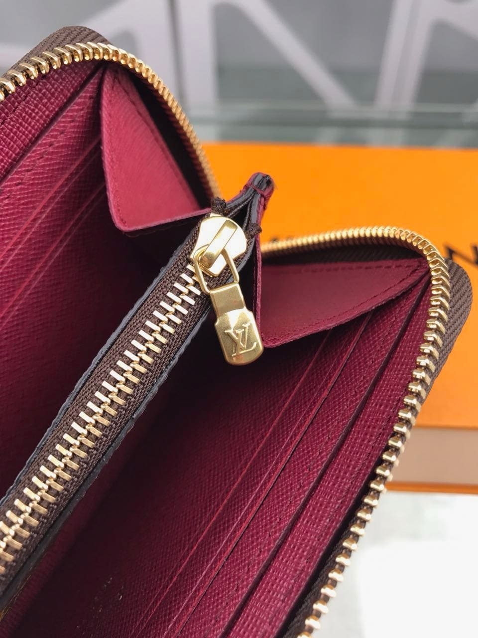 L0vis Vvtt0n Monogram Canvas Clemence Wallet M60742 Fuchsia