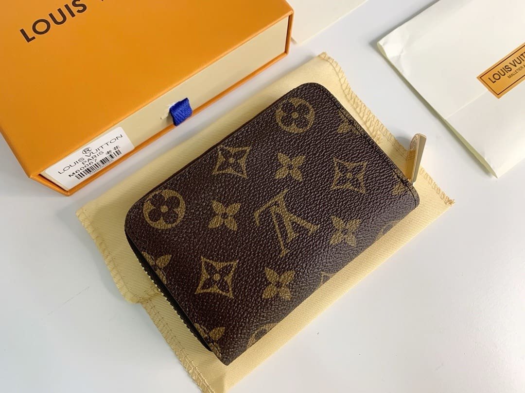 L0vis Vvtt0n M60067 Zippy Coin Purse
