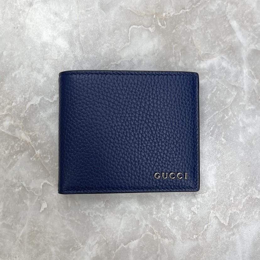 Bi-fold wallet with Gvc*1 script